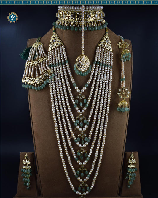 Hyderabadi Jadau Bridal Set: Sathlada necklace, choker, Maang Tikka & more. Gold-plated, customizable gemstones. Made-to-order